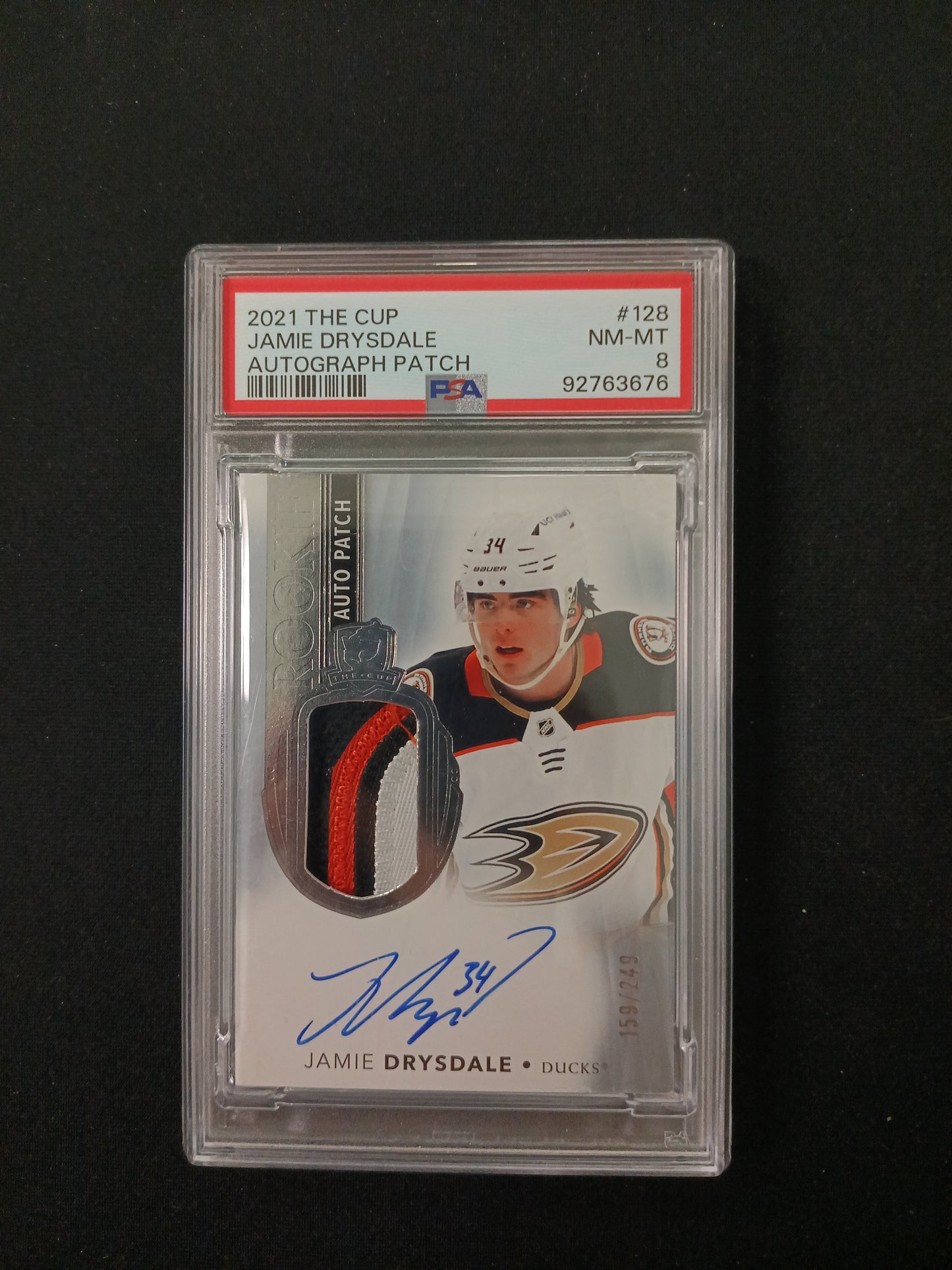 Hockey trading card featuring Jamie Drysdale with autograph and patch on a black background