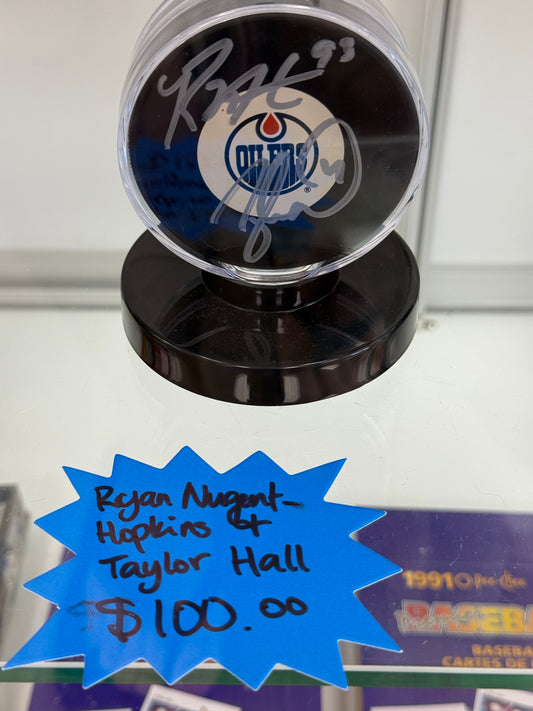 Ryan Nugent-Hopkins & Taylor Hall Autographed Puck