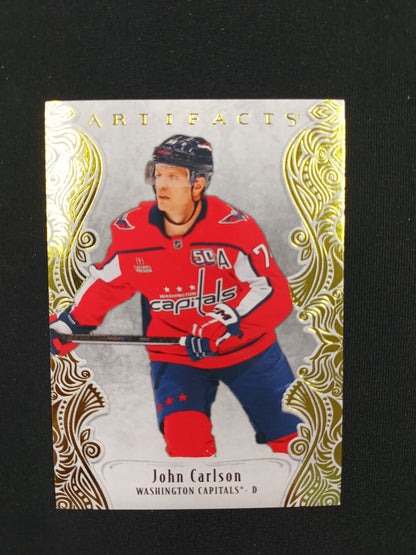 49/50 | John Carlson #116 Artifacts [Yellow]