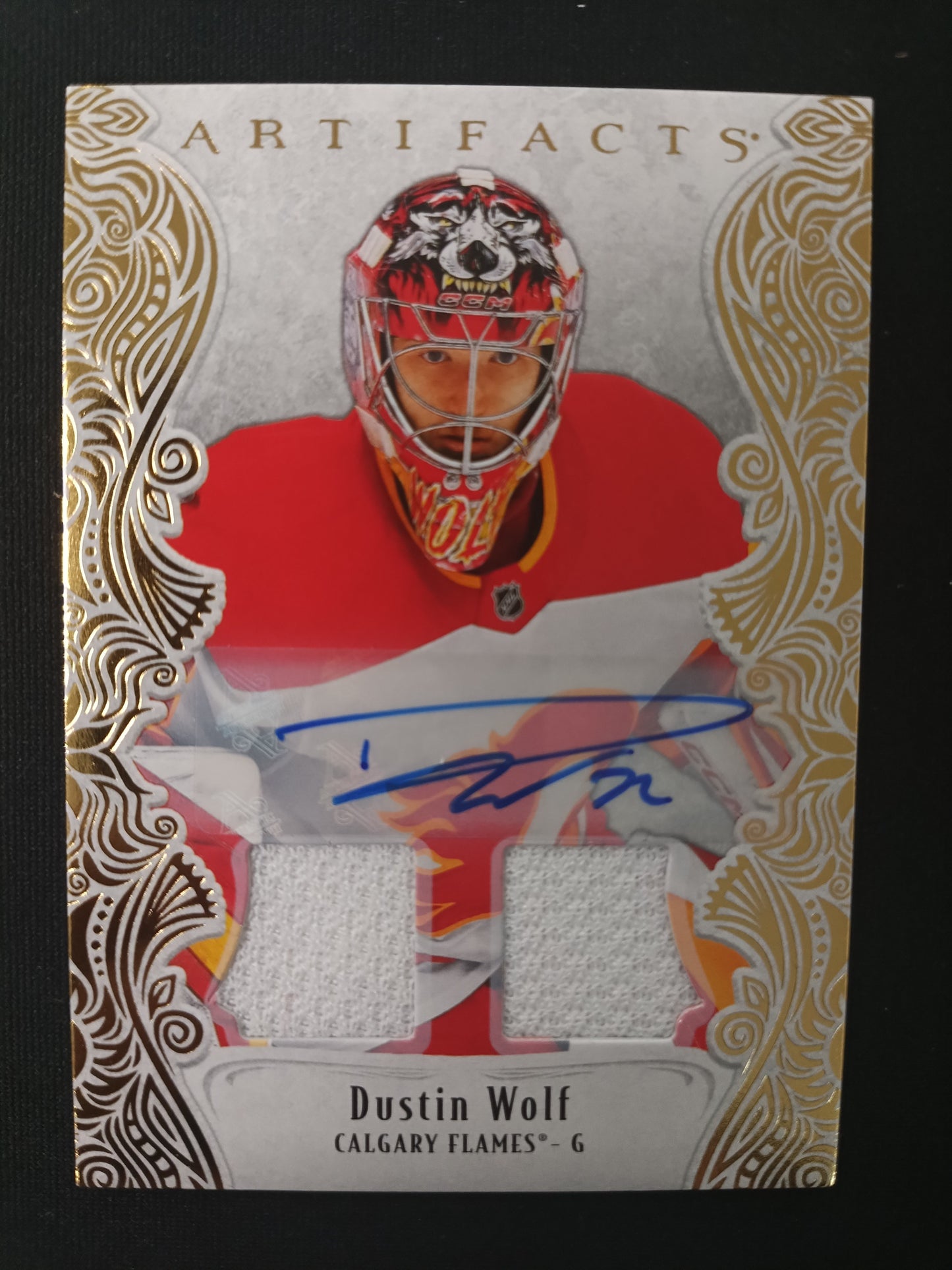 52/65 | Dustin Wolf #149 Artifacts [Gold Material Auto]