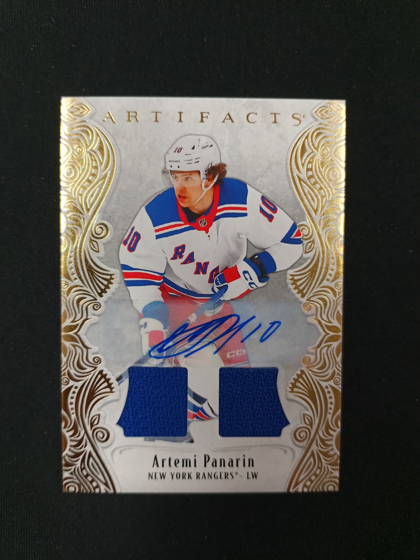 09/45 | Artemi Panarin #133 Artifacts [Gold Material Auto]